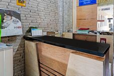 ロビー OYO 93439 The Suites Metro Apartment By Interindo