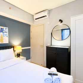 Bedroom 1 Cozy Designed 2BR with Working Room Apartment at Meikarta By Travelio, Telaga Seafood Cikarang Restaurant Hotels