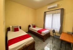 ห้องนอน 2 RedDoorz Syariah @ Jitu Guest House Purwokerto