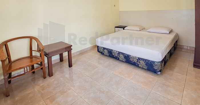 Bedroom Aman Guest House Redpartner