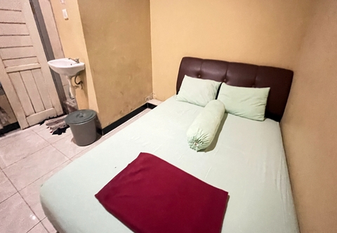 Kamar Tidur OYO 93416 Wisma Alam Syariah