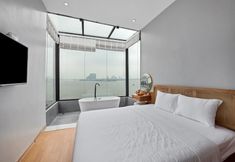 Bedroom 6 22Housing Lake view Residence
