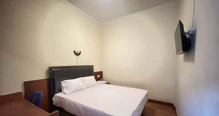 Bedroom LestInn Homestay Monjali Mitra RedDoorz