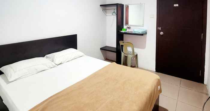 Bedroom WSL Hotel Mitra RedDoorz