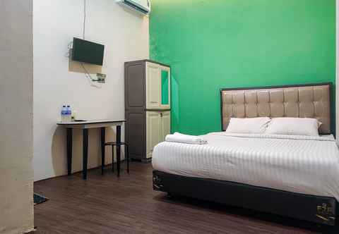 Bedroom RedDoorz Syariah near Universitas Jambi Telanaipura