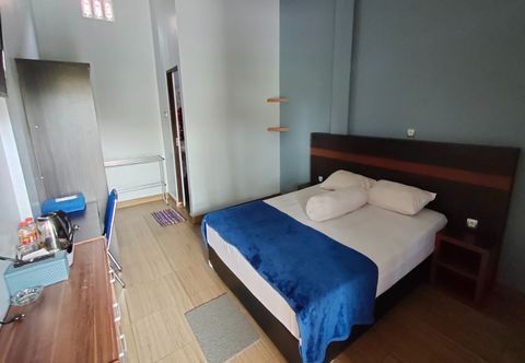 Bedroom OYO 93775 Nilam Guest House