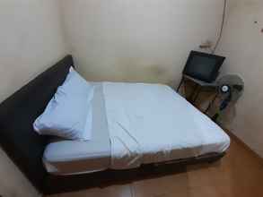 Bedroom SPOT ON 93776 Intan Homestay