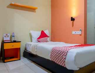 Bilik Tidur 2 Capital O 989 Audah Guesthouse Syariah