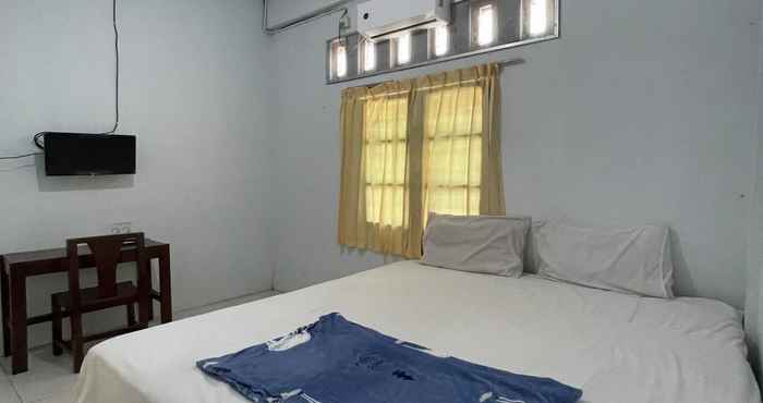 Bedroom OYO 93507 Saril Riverside Homestay