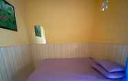 Bilik Tidur 3 OYO 93638 Lotus Guest House