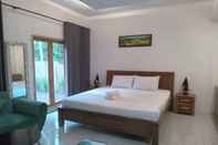 Bedroom OYO 93748 Tungku Klui Hotel