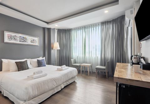 ห้องนอน Ployburi Boutique Hotel