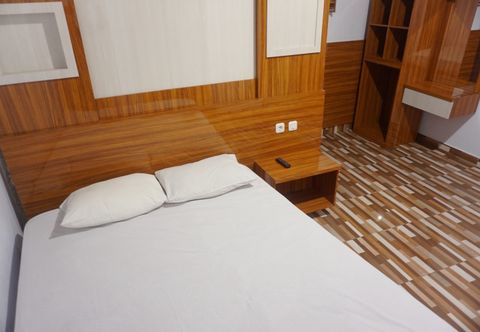 Bedroom OYO 93770 Pondom Danu 77