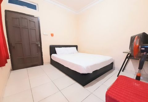 Bedroom Hotel O Pondok Anie SyariahNearJembatan Siak