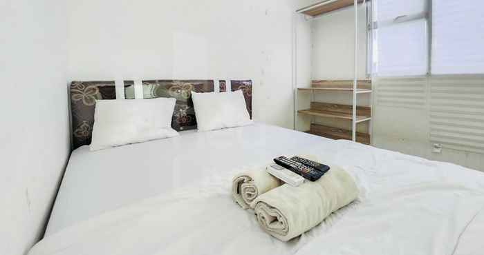 ห้องนอน RedLiving Apartemen Urbantown Serpong - Aurora Rooms