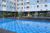 Swimming Pool RedLiving Apartemen Urbantown Serpong - Aurora Rooms