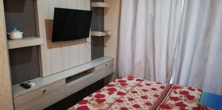 Bedroom 4 Hotel O Apartment Grand Asia Afrika By Prisma