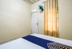 ห้องนอน 6 SPOT ON 93612 Kencana Homestay Syariah Near Masjid AL-BAROKAH Kanyuran