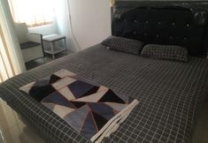 Bedroom 7 OYO 93386 Apartemen Grand Sentraland by Mira