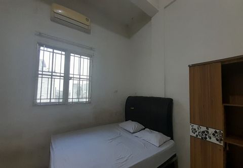Bedroom SPOT ON 93782 Hasibuan Homestay Syariah