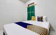 Bedroom 6 SPOT ON 93717 Nayus Homestay Syariah 4