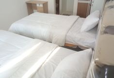 Bedroom 3 Hotel O Neva Guest House SyariahNearWaduk Cipta Karya