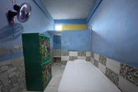 Bedroom SPOT ON 93874 3n Homestay Syariah