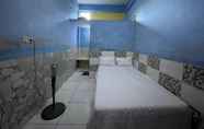 Bedroom 7 SPOT ON 93874 3n Homestay Syariah