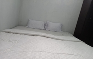 ห้องนอน 4 OYO 93847 Blio Guest House Syariah