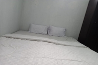 ห้องนอน OYO 93847 Blio Guest House Syariah