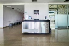 Lobby RedLiving Apartemen Enviro - Aurora Rooms