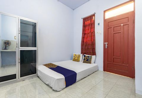 臥室 SPOT ON 93966 Dhiya Guest House Syariah