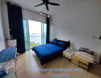 Bedroom 2 Infinite Seaview with Penang Bridge Suite with Sunrise up to 11 person