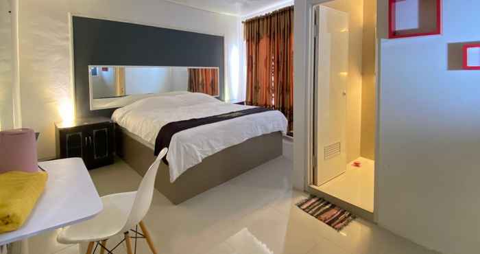 Bedroom RedDoorz near Bukit Ragas Hotel D'Ayanna