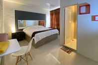 Bedroom RedDoorz near Bukit Ragas Hotel D'Ayanna