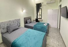 Phòng ngủ 2 Trubus Guesthouse Syariah Magelang mitra RedDoorz