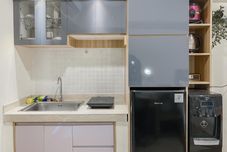 Common Space Homey and Good Place Studio Meikarta Apartment By Travelio