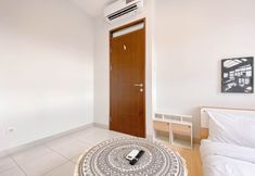 Bedroom 2 Minimalist Japanese Style 2BR at Mekarwangi Square Apartment Cibaduyut By Travelio