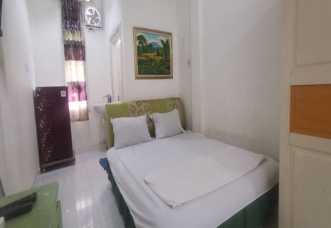 臥室 OYO 94078 Azzahra Homestay Syariah