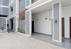 外観 3 OYO 94070 The Cozzy Exclusive Syariah