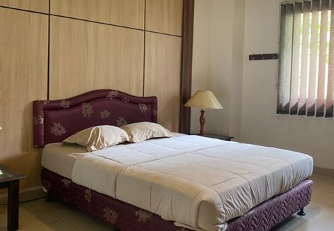 寝室 OYO 94107 Nomira Guest Room