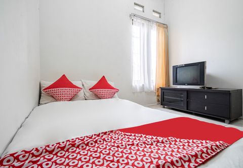 臥室 OYO 94102 Kuningan Guest House Syariah