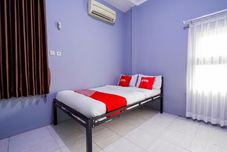 Bedroom Hotel O Pdl Guest House Syariah