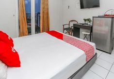 寝室 4 OYO 94117 Mr Rooms Appartement Mutiara