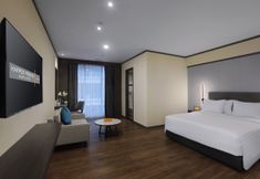 Bedroom 7 Harper Premier Nagoya Batam by ASTON