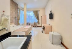 Phòng ngủ 3 Wisma Anggrek Syariah Mitra RedDoorz