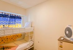 Bedroom 2 Simple and Warm 2BR at Meikarta Apartment By Travelio