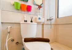 In-room Bathroom 7 Simple and Warm 2BR at Meikarta Apartment By Travelio