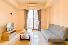 Common Space Simple and Warm 2BR at Meikarta Apartment By Travelio