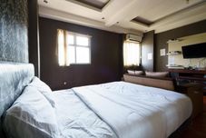 臥室 OYO 94238 The Suite Metro Apartment By Riz Living